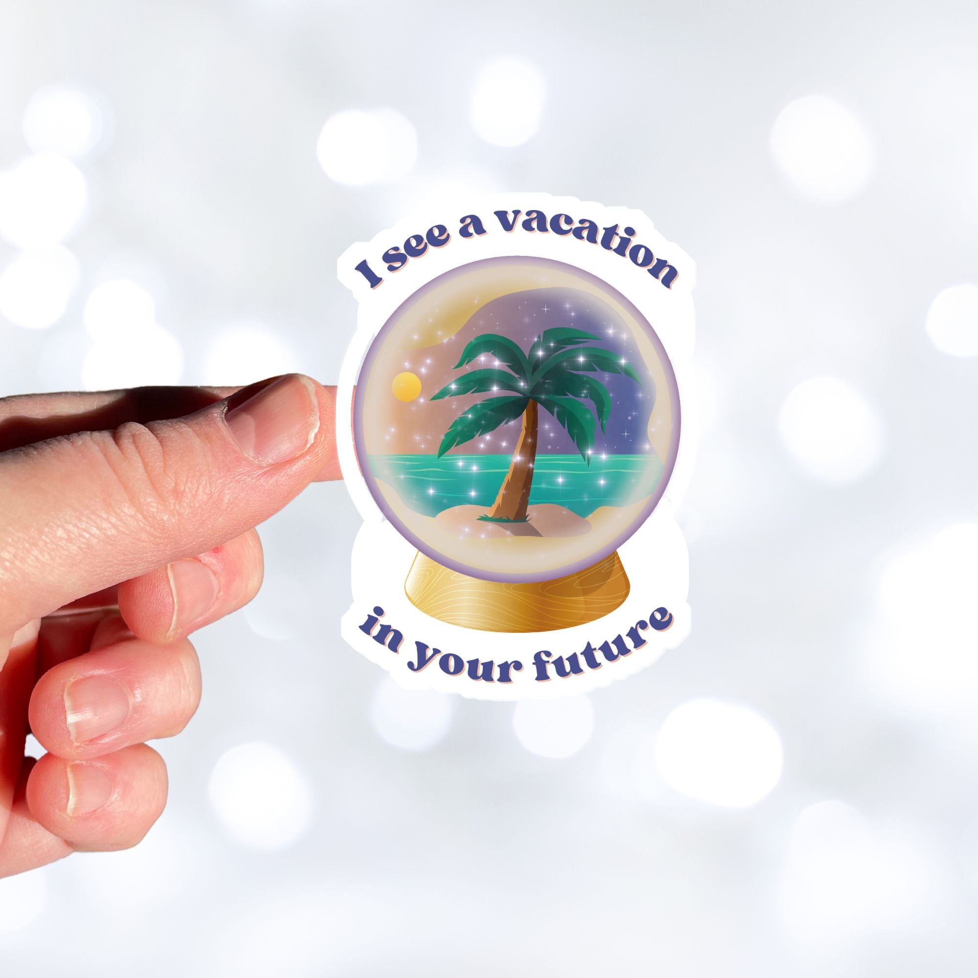 Who wouldn't love a vacation? This individual die-cut sticker shows a crystal ball showing a tropical island and the words "I see a vacation in your future". Outstanding! This image shows a hand holding the crystal ball sticker.
