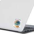 Load image into Gallery viewer, Who wouldn't love a vacation? This individual die-cut sticker shows a crystal ball showing a tropical island and the words "I see a vacation in your future". Outstanding! This image shows the vacation in your future sticker on the back of an open laptop.
