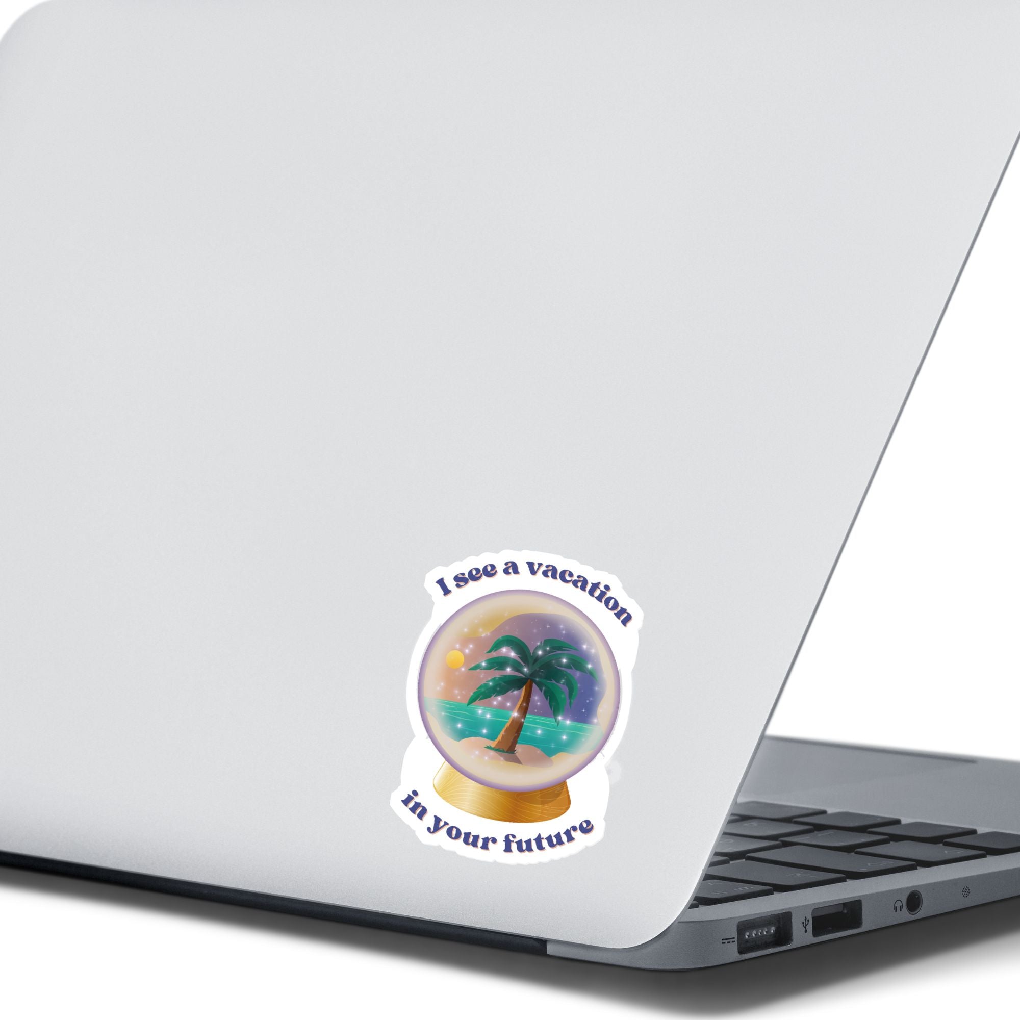 Who wouldn't love a vacation? This individual die-cut sticker shows a crystal ball showing a tropical island and the words "I see a vacation in your future". Outstanding! This image shows the vacation in your future sticker on the back of an open laptop.