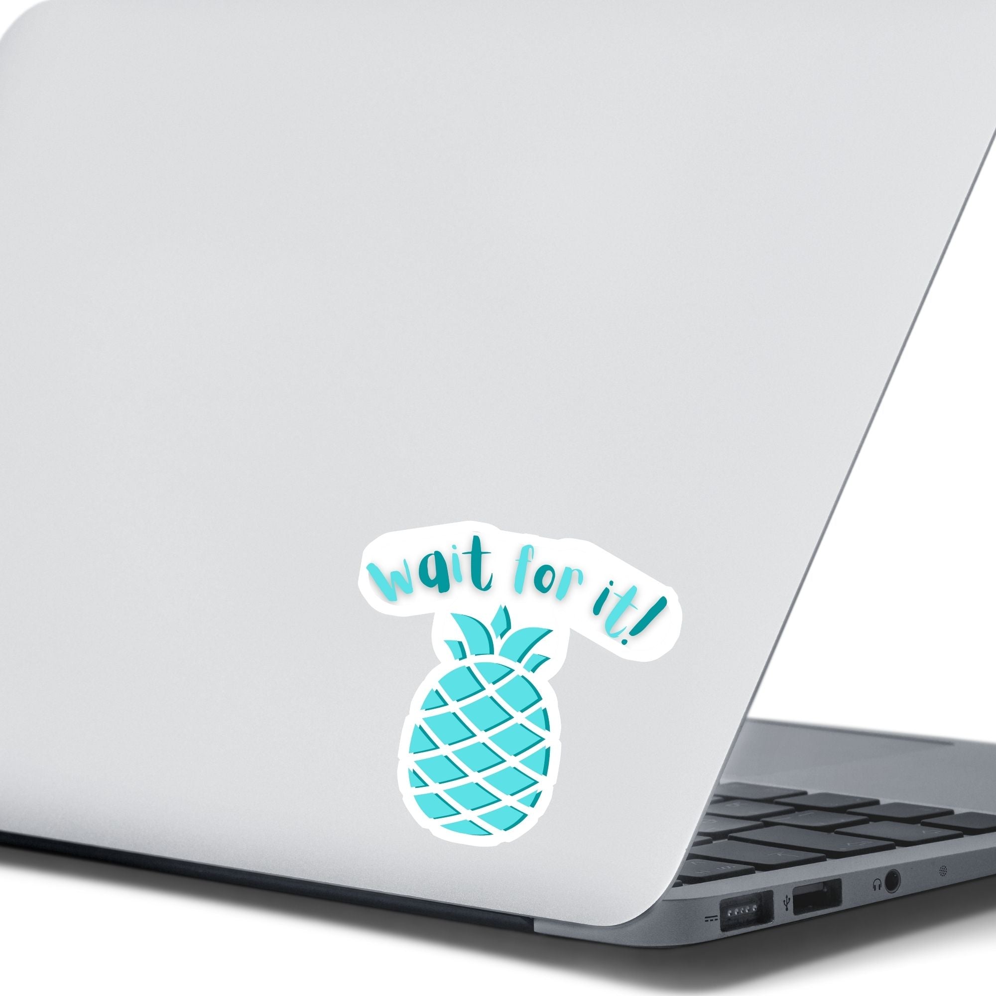 Don't get psyched out by this individual die-cut sticker! It features a teal blue pineapple with the words "Wait for it!" above. This image shows the Wait for it! sticker on the back of an open laptop.