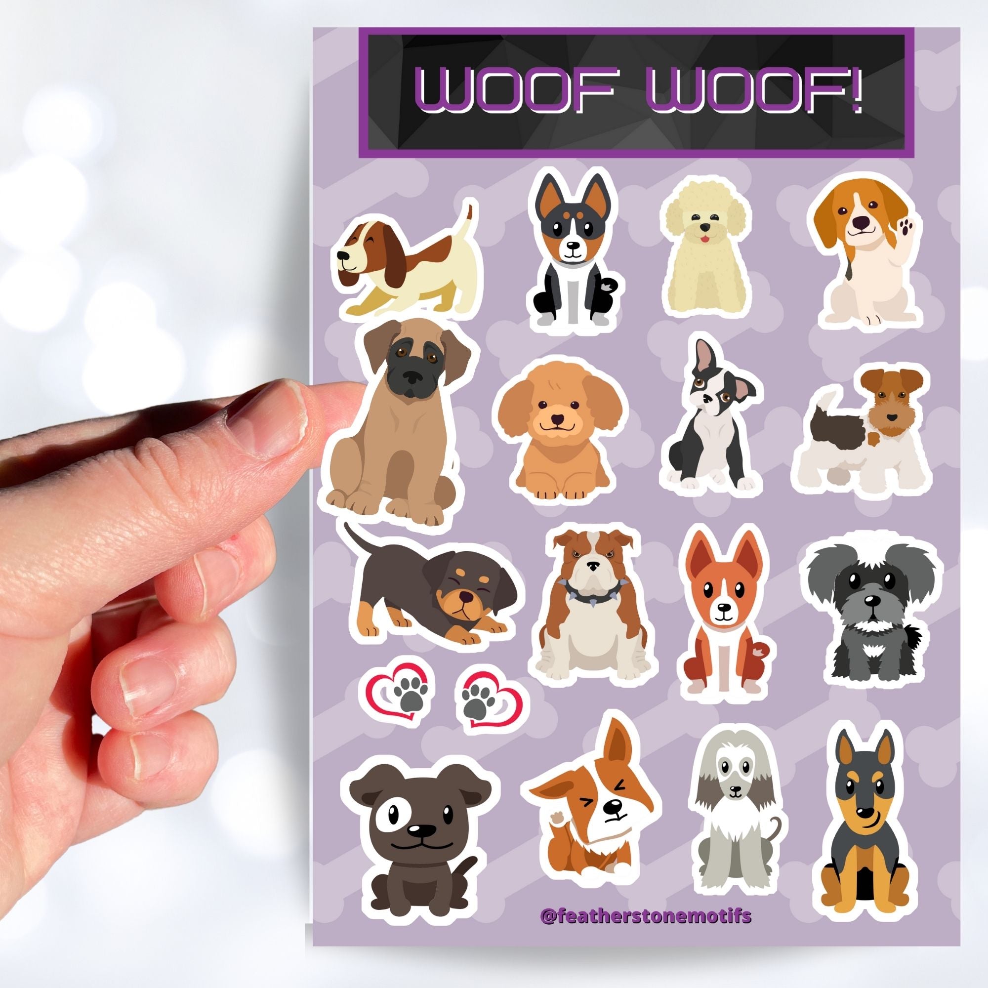 Dog lovers, this sticker sheet is for you! It has sticker images of 16 different dogs plus 2 heart paw stickers. Is your favorite puppy here?  This image shows a hand holding a sticker of a Great Dane puppy above the sticker sheet. 